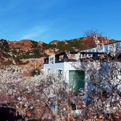 Qingdao Laoshan Huatianyimu Homestay โรงแรมใกล้ภูเขาเลา