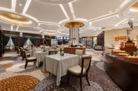 Huancheng Caston Hotel - servizio colazione