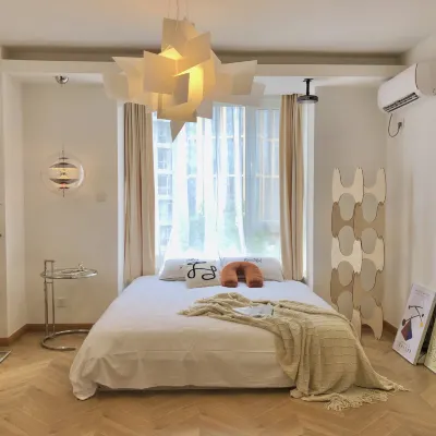 Qihai Shijia Apartment (May Fourth Square Wanxiangcheng) โรงแรมใกล้หาดชิงเต่าที่สอง
