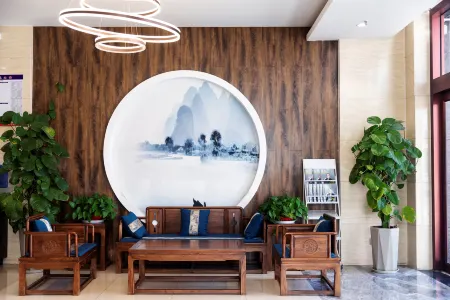 Shell Hotel (Fei County Dongfang Shopping Plaza Ginkgo Jin Street)