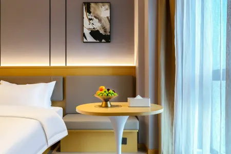 Pinxi Hotel (Kunming Dianchi Houhai Sunac Cultural Tourism City Branch) Отели рядом с достопримечательностью «Sanjiacun Reservoir»