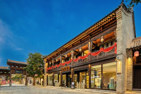 Lanting Xu Hot Spring Hostel(Xinzhou Ancient City Branch) Отели рядом с достопримечательностью «Xiurong College»