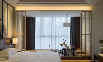 Xiangtan Mingyi Hotel (Bantang City Railway Station Store)