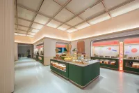 Orange Hotel (Leshan High-speed Railway Station Shihao Plaza)