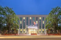 UP Huayi International Hotel Отели рядом с достопримечательностью «Дун Ши Парк»