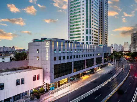 Magnotel Business (Tianjin Eye Store at Tianjin Station) Отели рядом с достопримечательностью «Dabei Temple»