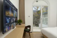 Muguang Qing'an Yinsa Guesthouse (Silver Beach Qiaogang Branch)
