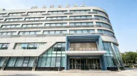 Homeinn Selected Hotel (Korla Jiaotong West Road People's Square) - خدمة نقل من وإلى المطار