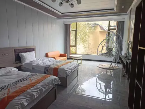 Yuchangchenglin Homestay - شرفة