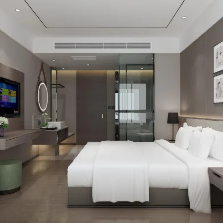 Shengyue Business Hotel (Subway Station of People's Hospital, Jiankang Road, Zhengzhou) Отели рядом с достопримечательностью «Хэнаньский экзаменационный центр для экзаменов гражданской службы, образовательный центр Huatu»