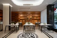 Kana Business Hotel (Zhanjiang Haitian Park Yingzhan Holiday Plaza)