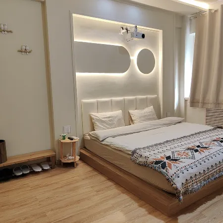 Hanhan Apartment (Harbin Shida Night Market Shop) Отели рядом с достопримечательностью «Колледж Jiangnan-Библиотека Университета Мастера Харбина»