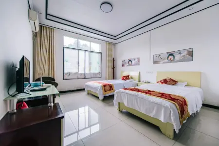 Xingwen Shihai Shu's Homestay Отели рядом с достопримечательностью «Xing Wen Shi Hai»