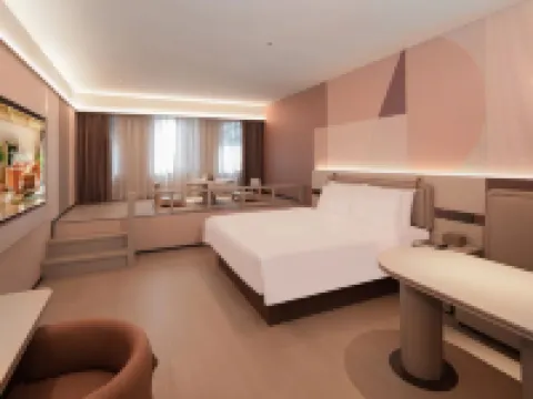 Orange Hotel (Baoying Peiyou International Baitian North Road) โรงแรมในเป่าหยิง