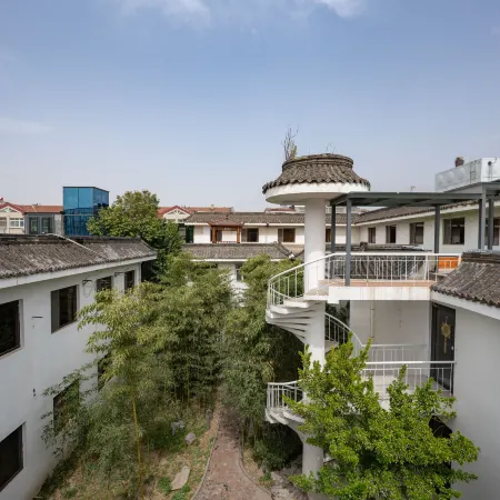Taibai Restaurant Boutique Garden Hotel (West to Jining North Bus Station)