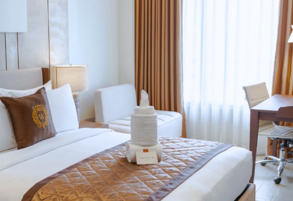 [그랜드 웨스트사이드 마닐라 베이의 모던한 객실 내부 이미지]