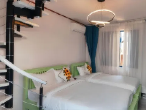 Vip Kingson Guest House Hôtels à proximité de : Temple d’or de la ville (Wat Xieng Thong)