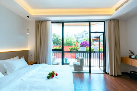 Shufei Homestay (Kunming Dianchi Lake Viewing Pier Yinghai Road Subway Station) Отели рядом с достопримечательностью «Kunming Xishan Scenic Resort»