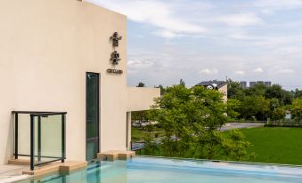 Xindu Xiangtou Qingan Daotian Hotel