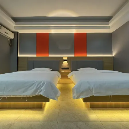 Shixing Xinjia Business Hotel