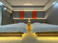 Shixing Xinjia Business Hotel