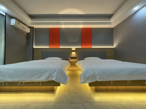 Shixing Xinjia Business Hotel