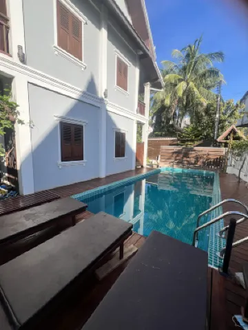 Queen's House Hoteles cerca de Wat Mai