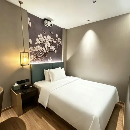 Magnotel Hotel (Weihai Weigao Plaza Xingfumen)