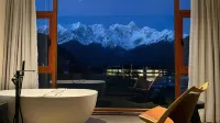 Pingcuokangsang Xuelitaohua Vacation Manor Hotel di Mainling