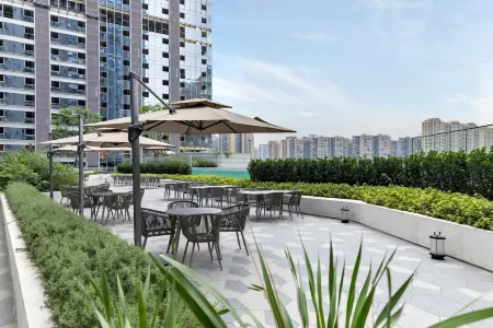 FILY Full Suite Service Apartment (Tianfu 3rd Street Shihao Plaza) Отели рядом с достопримечательностью «Tiexiang Temple»