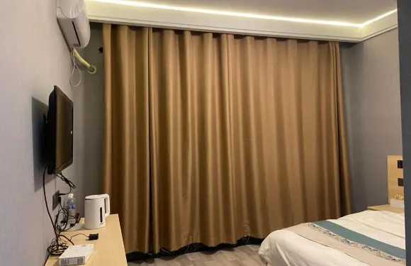 美姑遠帆商務酒店