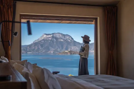 Qianshanji Hotel Отели рядом с достопримечательностью «Lugu Lake Viewing Platform»