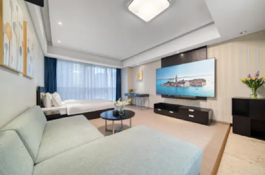 เซอร์วิสอพาร์ตเมนต์ เคนดิง โรงแรมในเขตปินเจียง