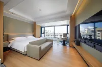 GELAIER HOTEL Hotel dekat Guodong