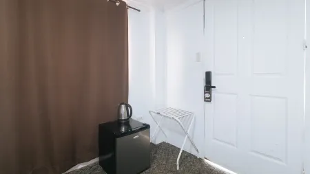 RedDoorz Premium @ THE GRAND PENINSULA SUITES Отели в г. Батаан