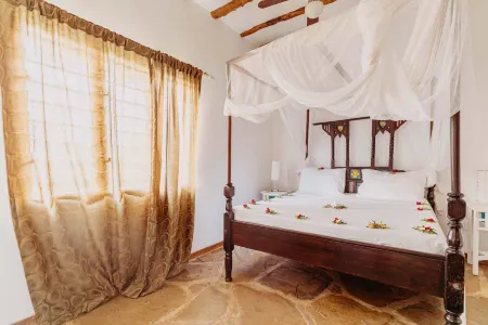 Exploreans Malaika Villas & Beach Club Отели в г. Малинди