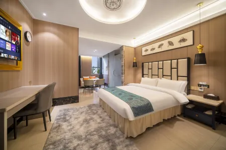 Songdeju Hotel (Jiujiang Lushan Station Zhonghua Xianmu Garden Branch) Отели рядом с достопримечательностью «Jiangxi Vocational College of Finance and Economics Balihu Campus»