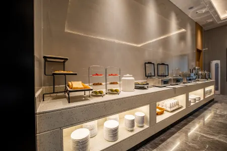 Xinyi Hotel (DongGuanLiaobuwanrunguangchang) Отели рядом с достопримечательностью «Dongguan Xiangshi Zoo»