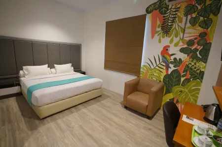 Front One Green Boutique Hotel Abepura Отели в г. Wai Mhorock