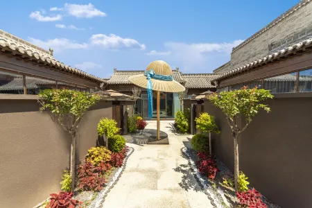 Yunbo Hot Spring Resort Hotel Отели рядом с достопримечательностью «Xinzhou Ancient City - South Gate Tower»