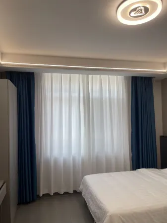 Hongtai Homestay (Lujiang Bus Station) Отели рядом с достопримечательностью «Tomb of Zhou Yu»