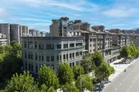 梁平名湖酒店（梁平南站雙桂湖國家濕地公園店） 鄰近雲樽牆面藝術定製（梁平大師館）的酒店