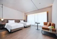 Novotel ยุนจิน คุนหมิง โรงแรมในศูนย์กลางหอประชุมและนิทรรศการนานาชาติคุนหมิง