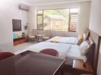 Xingyi Jinyuxuan Homestay - บริการรถรับส่ง