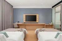 Apricot · Xingzi Hotel (Maralbexi Taihe Plaza) - 2-Star