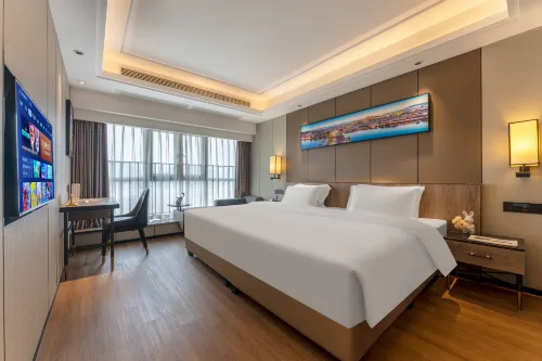 Binjiang Shenghui Apartment - พร้อมอาหารเช้า