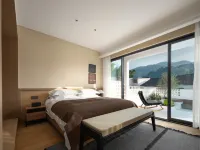 Jiuhuashan Xiangzili Homestay (Meat Body Palace Branch) فنادق في تشينغيانغ