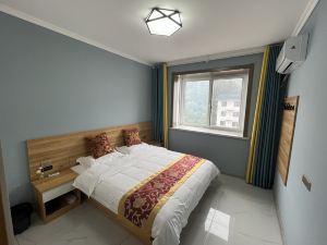 Luchuan Shenghe Homestay