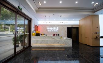 Junyi Business Hotel (Jishou Private Community Building Materials Home Furnishing Exhibition Center)