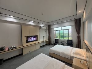 Wanning Wanmuchun Business Hotel